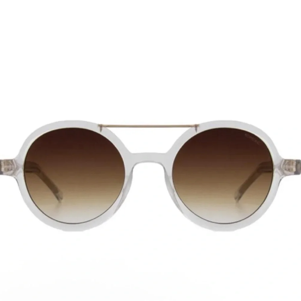 KOMONO Round Clear Sunglasses with Brown Gradient Lenses The Vivien